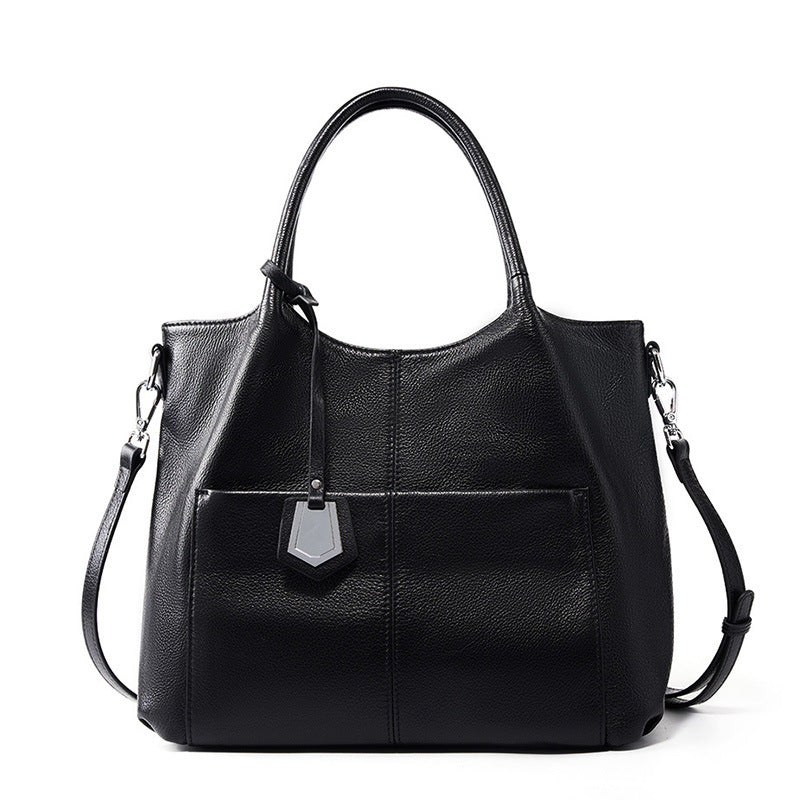 Malas de pele genuína para mulheres, novas malas de ombro simples para primavera/verão 2026, malas tote de grande capacidade feminina, malas para mães de meia-idade, malas crossbody