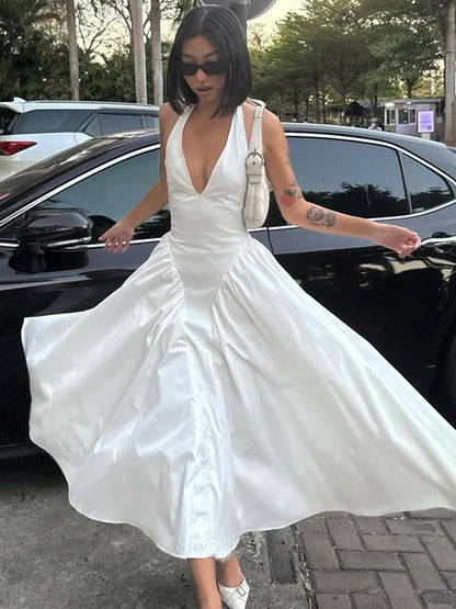 Vestido elegante e elegante para mulheres, vestido bestseller cross-fronteiriço da Amazon, de cor sólida, sexy com decote oco oco em V profundo