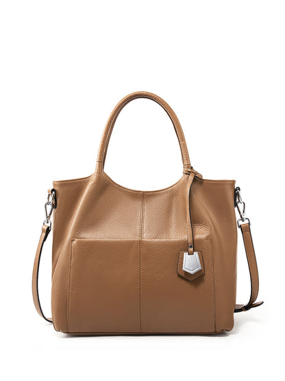 Malas de pele genuína para mulheres, novas malas de ombro simples para primavera/verão 2026, malas tote de grande capacidade feminina, malas para mães de meia-idade, malas crossbody