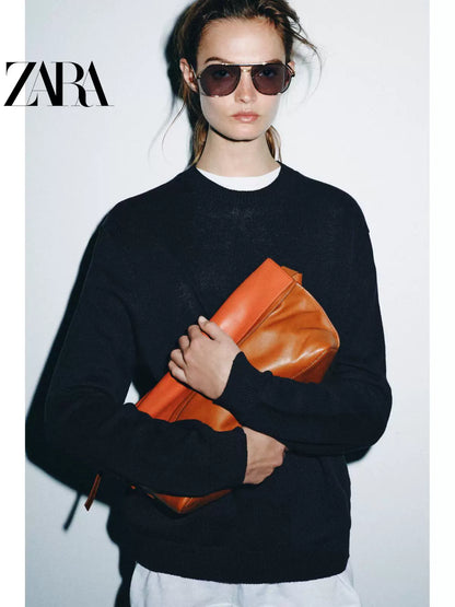 Bolsa envelope feminina longa de couro com aba dupla e blocos de cores da ZARA, coleção verão 2026 (código: 6042810 183).