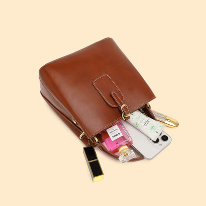 Malas femininas, nova bolsa versátil primavera/verão 2025, mala crossbody de grande capacidade de alta gama, mala de ombro simples em pele genuína