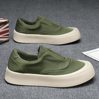 Sapatos Casuais Masculinos 2025 Novos Sapatos Slip-On de um pé, Sapatos de Tábua Respiráveis com Superfície de Tecido, Sapatos Modernos Versáteis de Lona de Sola Macia para Homens
