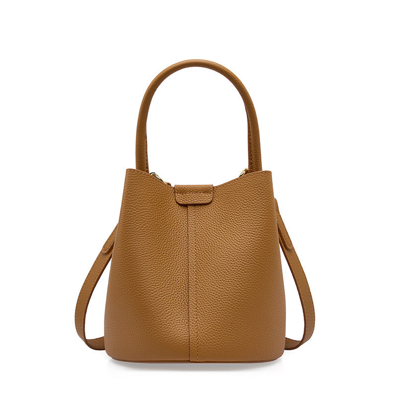 Bolsas de vaca de topo de grão 2026 Novas malas femininas, bandoleiras, malas de nicho de verão em pele genuina de alta qualidade, sacos bucket