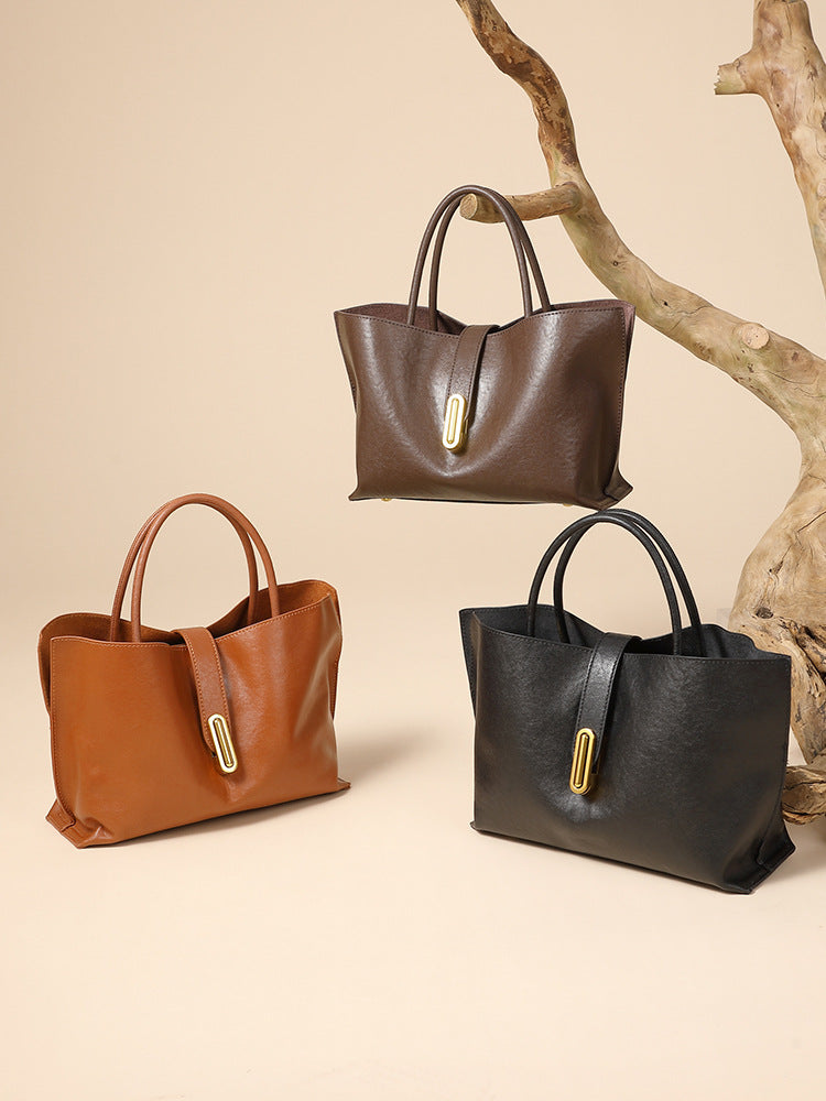 Malas femininas transfronteiriças, nova mala tote de vaca curtida vegetal topo de grão, mala de moda de nicho para pendulares, mala cruzada feminina