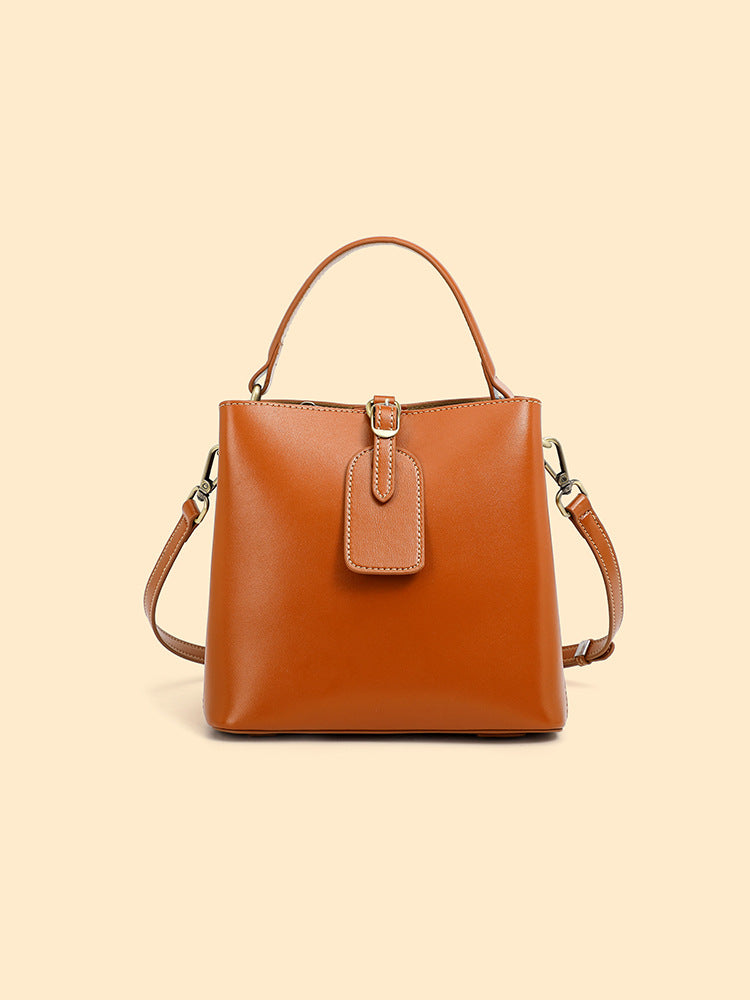 Malas femininas, nova bolsa versátil primavera/verão 2025, mala crossbody de grande capacidade de alta gama, mala de ombro simples em pele genuína