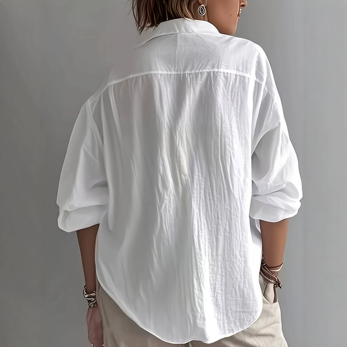 Camisa feminina elegante, europeia e americana, com textura de lapela transfronteiriça, com corte largo para esconder a pele e amagar o corpo, perfeita para as deslocações diárias