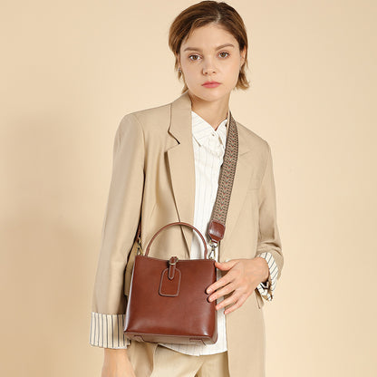 Malas femininas, nova bolsa versátil primavera/verão 2025, mala crossbody de grande capacidade de alta gama, mala de ombro simples em pele genuína