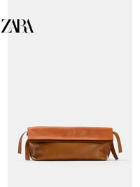 Bolsa envelope feminina longa de couro com aba dupla e blocos de cores da ZARA, coleção verão 2026 (código: 6042810 183).