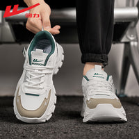 Os novos ténis na moda, versáteis e modernos da Warrior, sapatos casuais coreanos com blocos de cor de alto valor, sapatos masculinos confortáveis e baixos