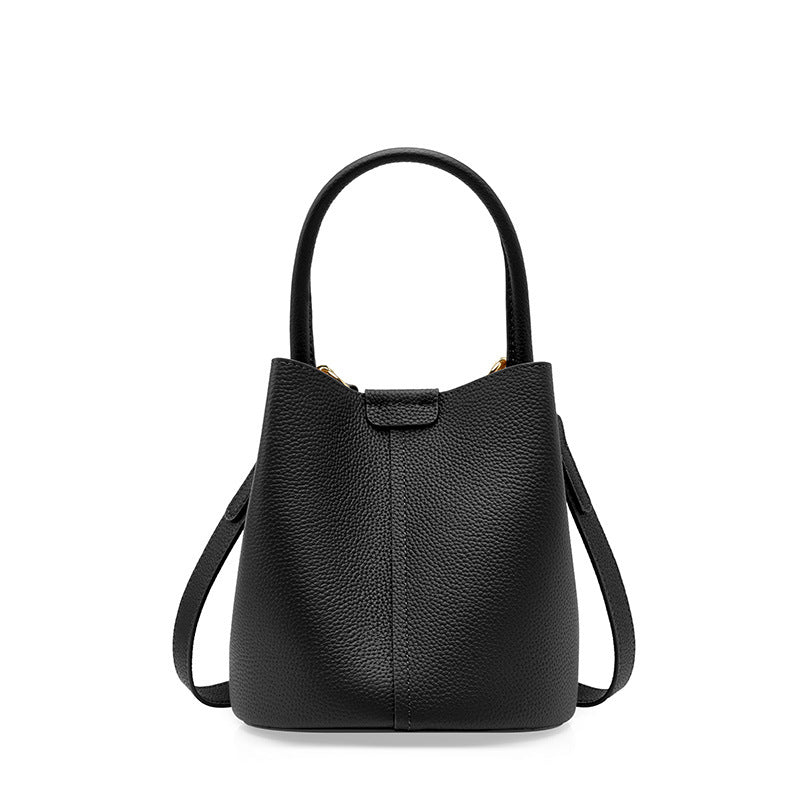 Bolsas de vaca de topo de grão 2026 Novas malas femininas, bandoleiras, malas de nicho de verão em pele genuina de alta qualidade, sacos bucket