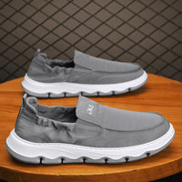 Sapatos masculinos de lona, respiráveis e resistentes a odores no verão, 2025 novos Sapatos Casuais Casuais Slip-on de Um Pé, Calçados Antigos de Pequim