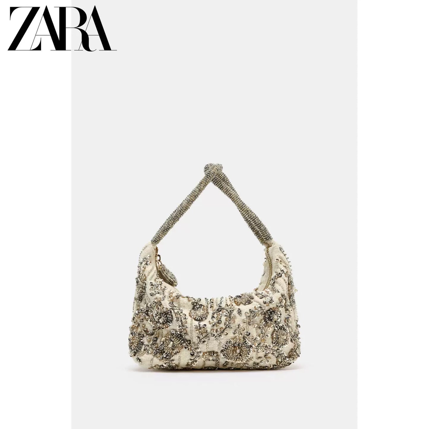 Bolsa feminina ZARA, lançamento da coleção verão 2026, com corpo adornado com miçangas e fecho de zíper, código 6413710 202.