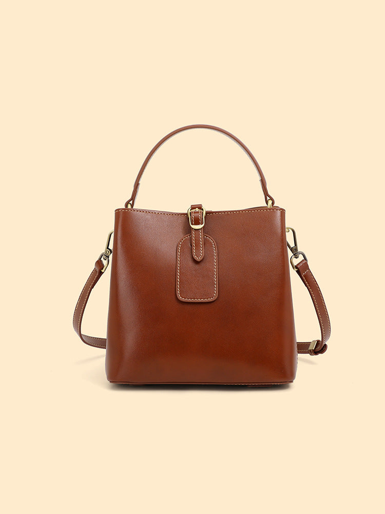 Malas femininas, nova bolsa versátil primavera/verão 2025, mala crossbody de grande capacidade de alta gama, mala de ombro simples em pele genuína