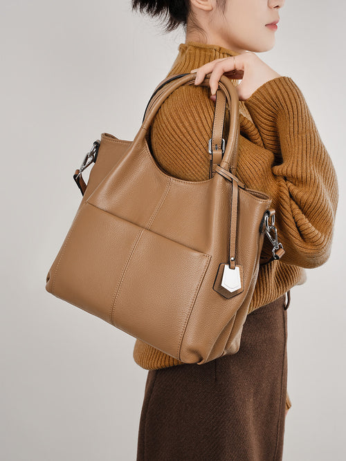 Malas de pele genuína para mulheres, novas malas de ombro simples para primavera/verão 2026, malas tote de grande capacidade feminina, malas para mães de meia-idade, malas crossbody