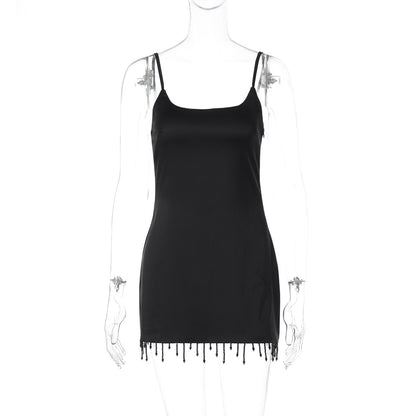 Vestido de moda de verão de moda transfronteiriça europeia e americana, de alta cor sólida, justo, sexy de retalhos com borlas e missangas para mulheres