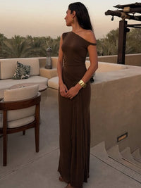 Roupa feminina transfronteiriça europeia e americana 2026 verão nova moda slim-fit diagonal sem mangas vestido de cor sólida por grosso