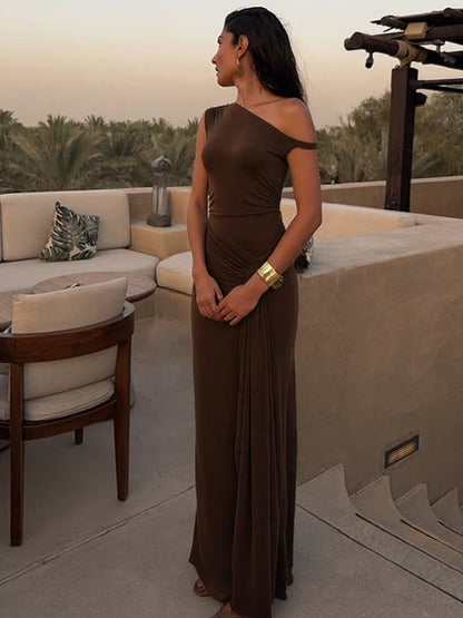 Roupa feminina transfronteiriça europeia e americana 2026 verão nova moda slim-fit diagonal sem mangas vestido de cor sólida por grosso