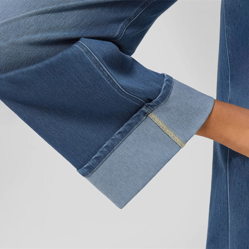Primavera 2025 Novos Jeans de Cintura Alta Cruzada Europeu e Americano de Perna Direita com Perna Esticada e Bainha Enrolada Calças Casuais de Perna Larga para Mulher