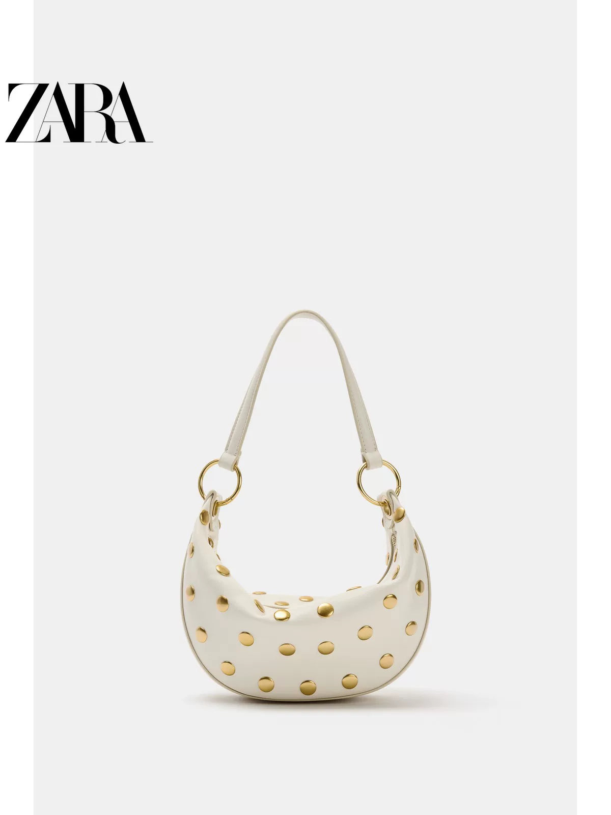 Bolsa feminina ZARA, lançamento da coleção verão 2026, com detalhes em rebites e zíper com argola metálica, modelo ombro, código 6094810 850.